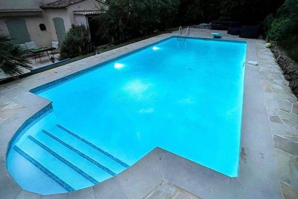 a swimming pool with steps and steps